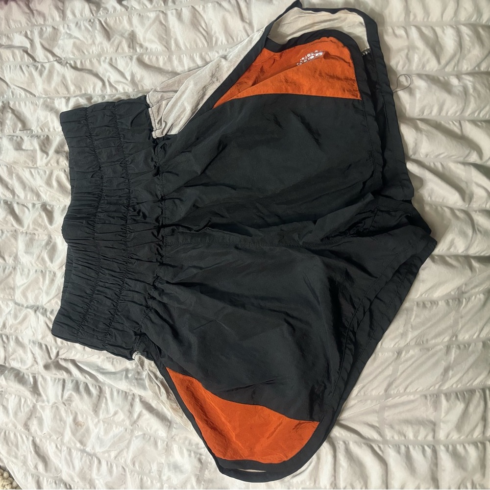 Orange, black, and grey free people shorts